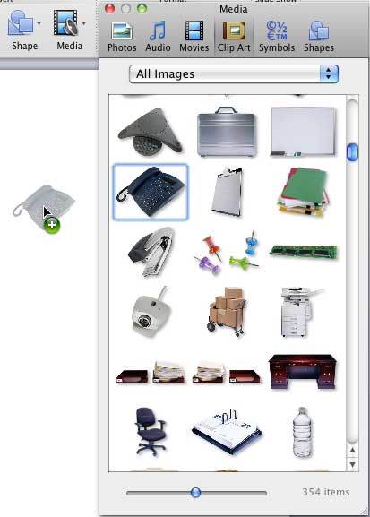 Clip Art graphic being dragged and inserted onto the slide area